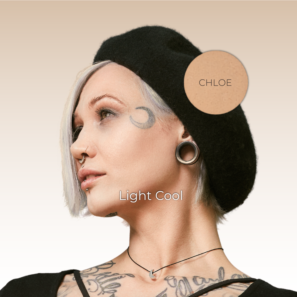 "Light skin model wearing ivory vegan mineral foundation"