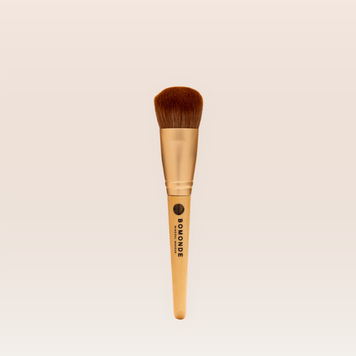"Vegan powder brush for loose powder application"