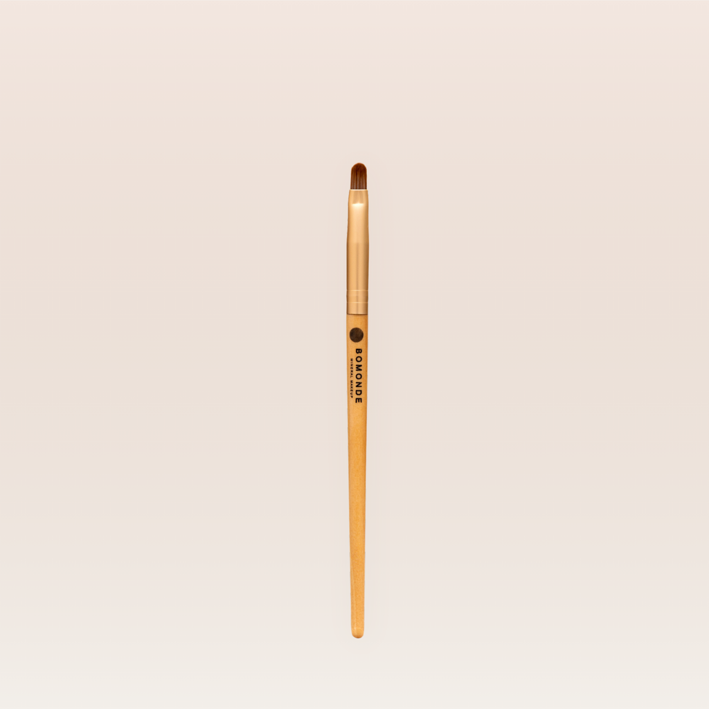 "Vegan precision eyeshadow brush for detailed work"